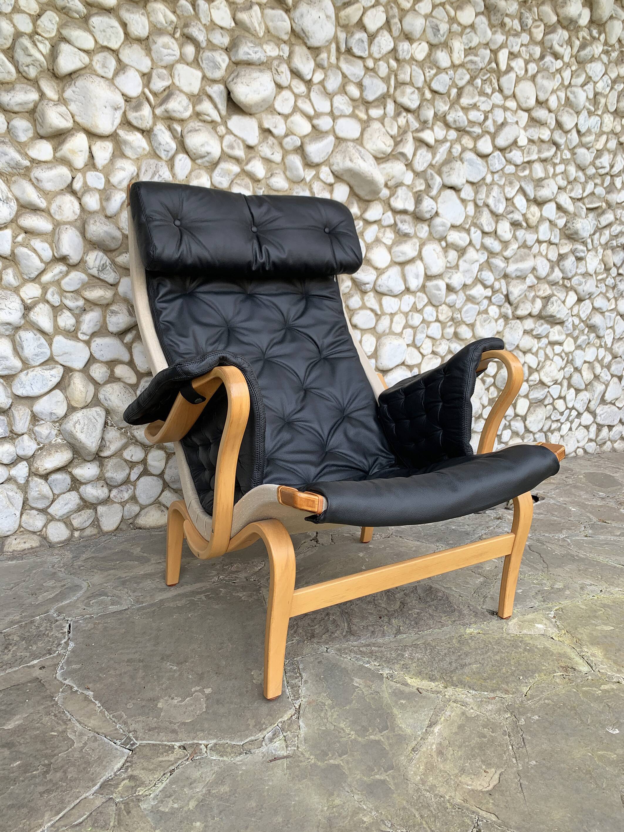 Pernilla armchair in new black leather by Bruno Mathsson, Dux, Sweden 1970