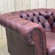 Chesterfield armchair in red leather from the 1980s