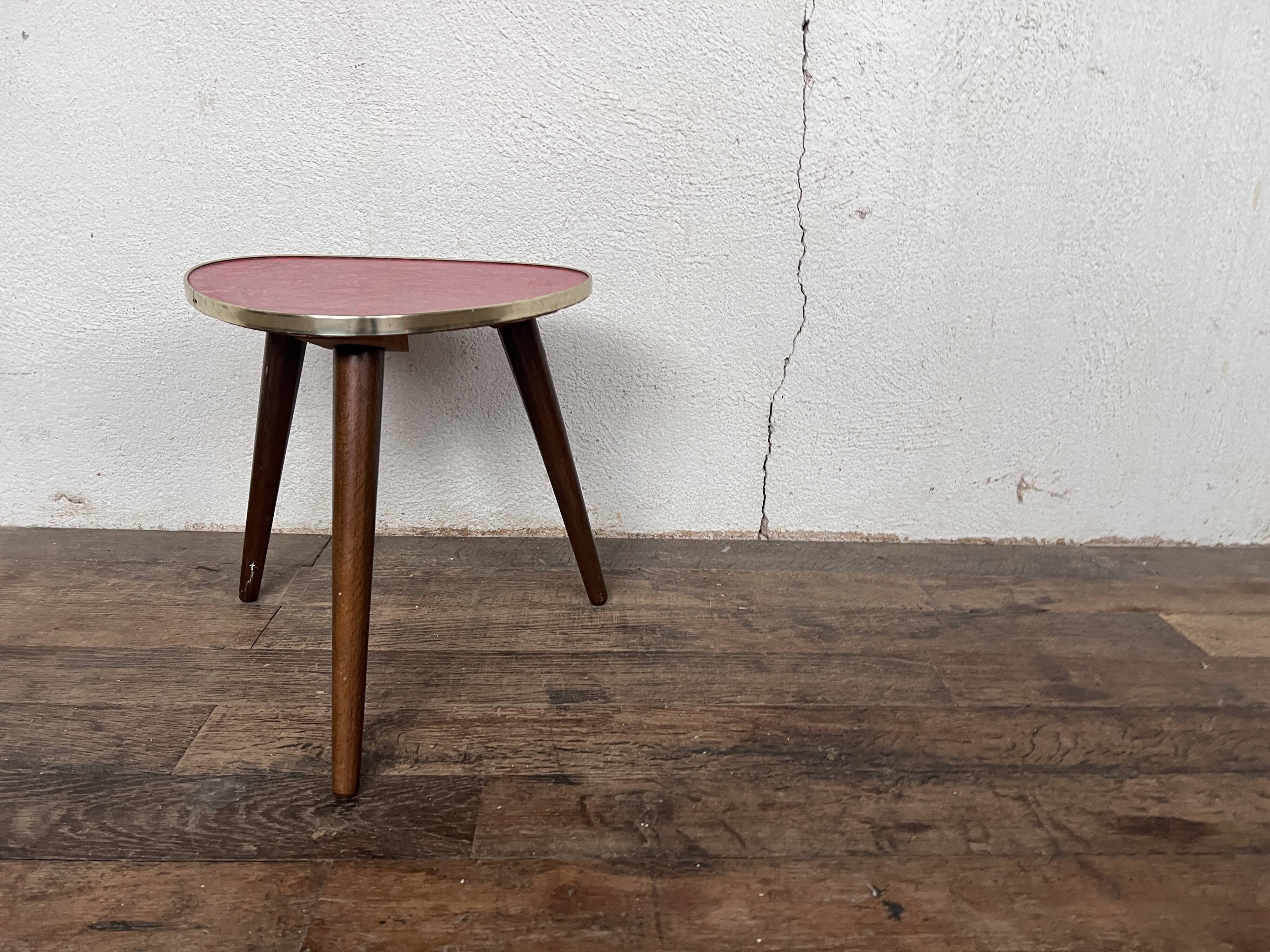 Triangular pedestal table small red table asymmetrical shape vintage tripod plant door