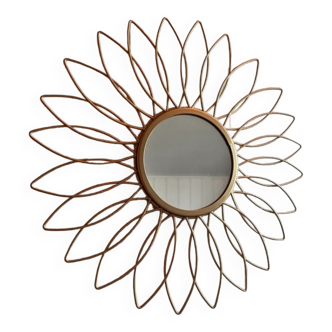 Sun mirror in gilded metal