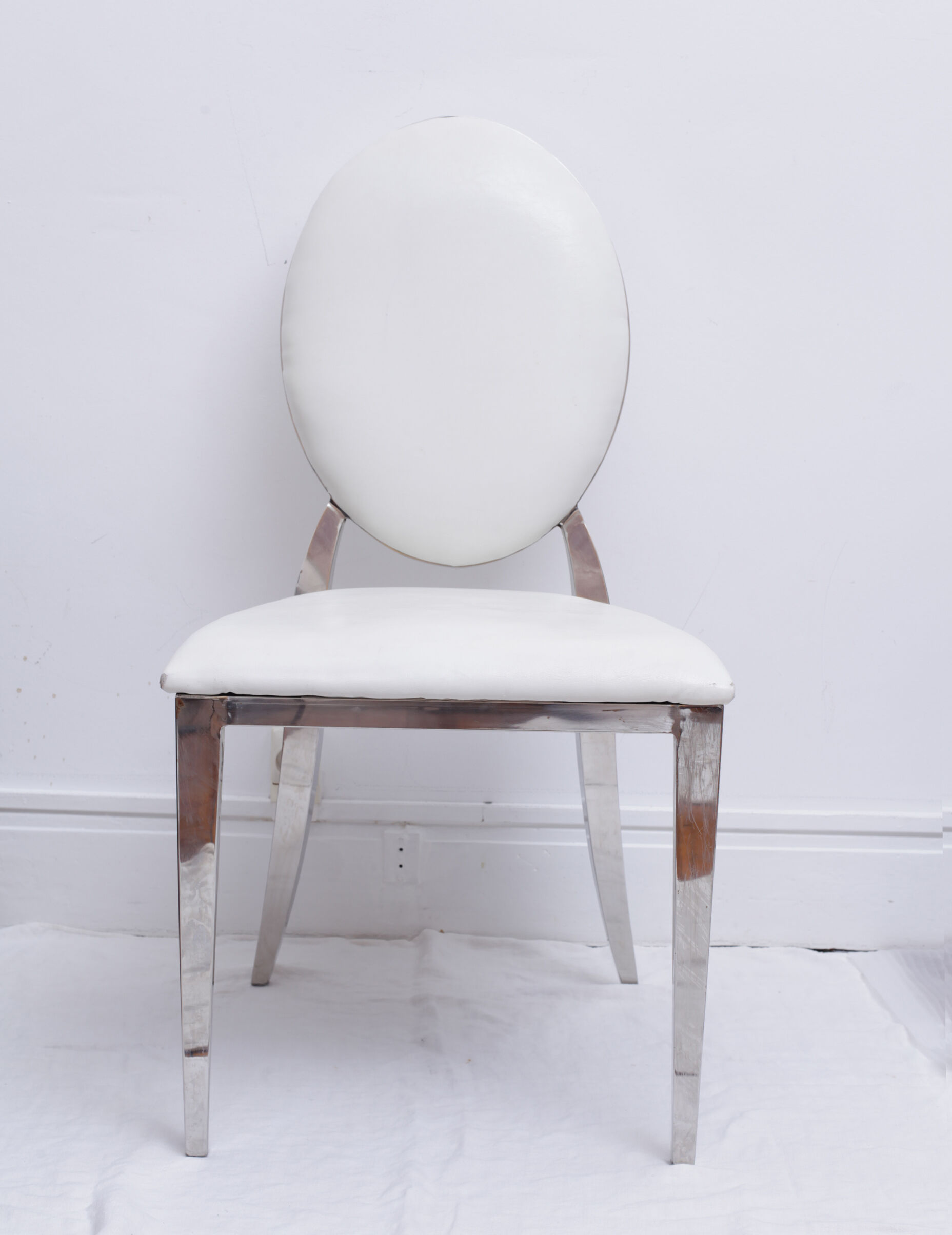 White skai chair and chrome legs