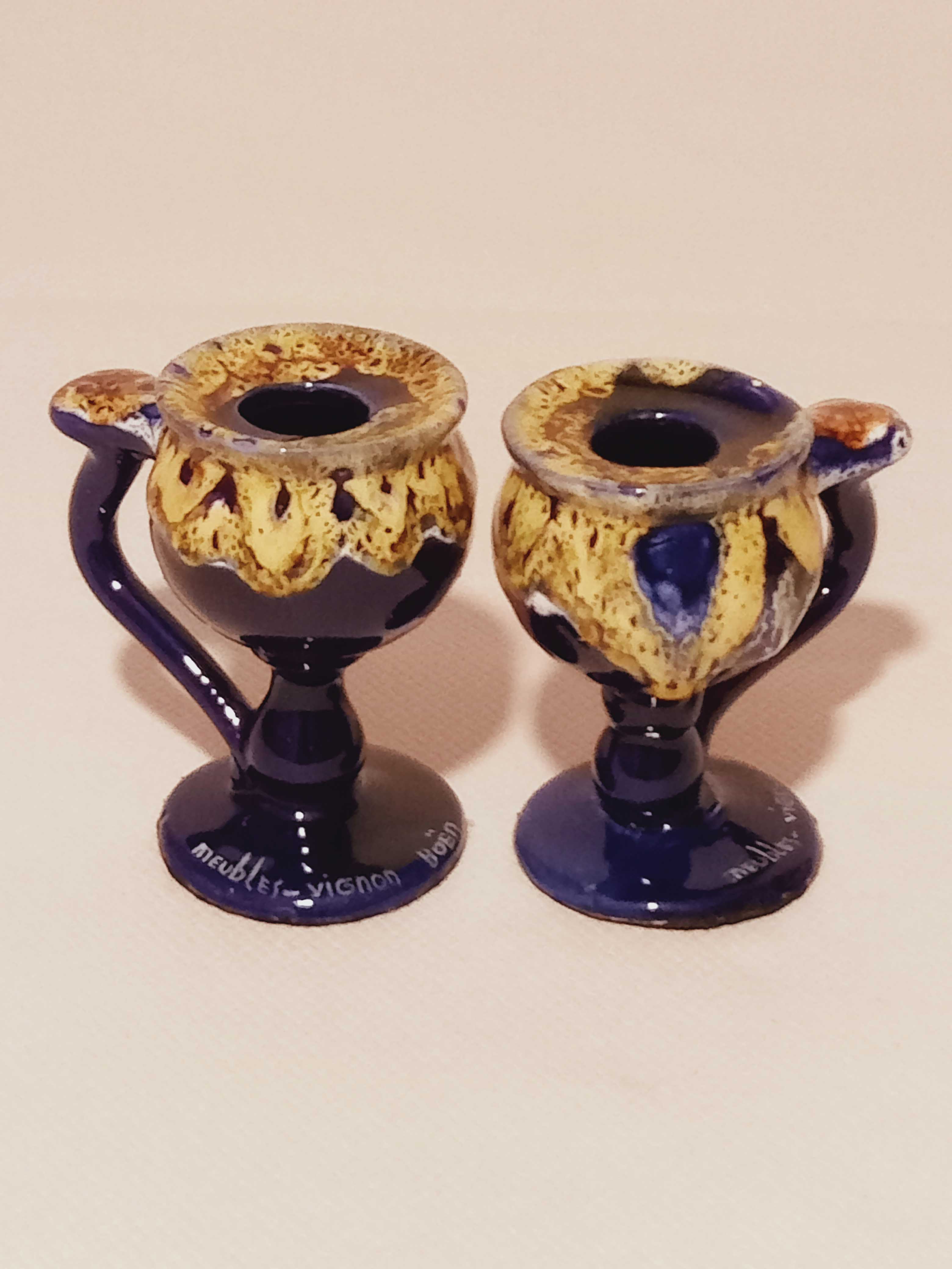 Pair of ceramic candle holders