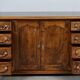 Rustic walnut sideboard with inlaid parquetry, vintage quality.