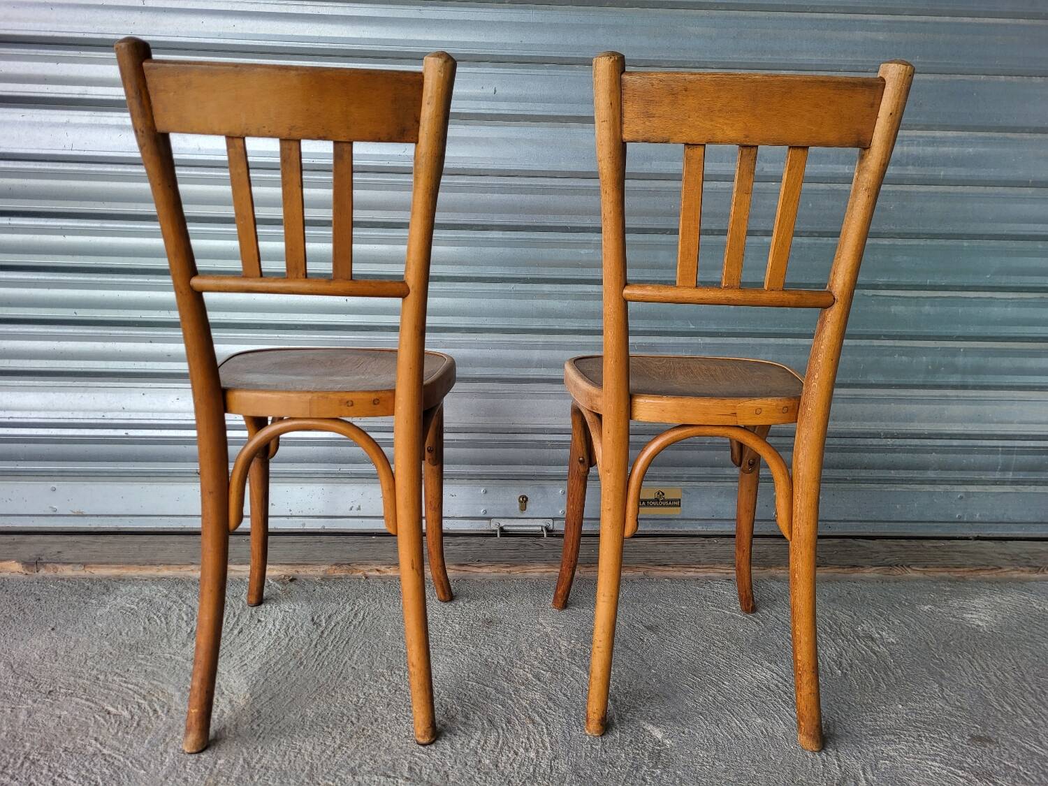 Pair of authentic antique Fischel Vintage bistro chairs
