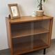 Vintage oak display cabinet from the 1960s.