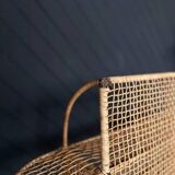 Steel and wicker wall shelf