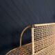 Steel and wicker wall shelf