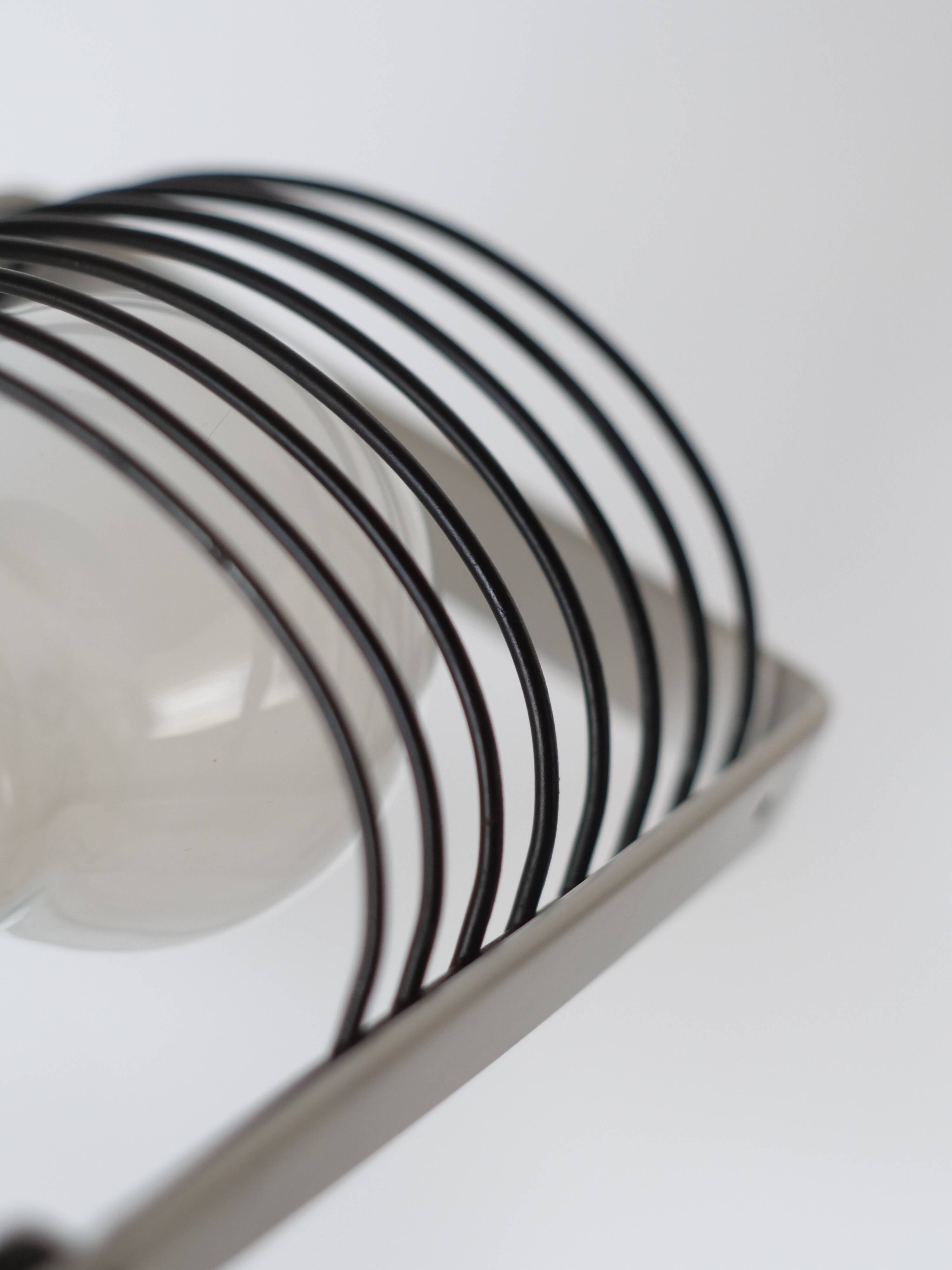 Artemide clamp lamp designed by Ernesto Gismondi model Sintesi