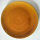 Set of green and amber enamelled plates