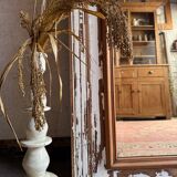 The large patinated trumeau mirror