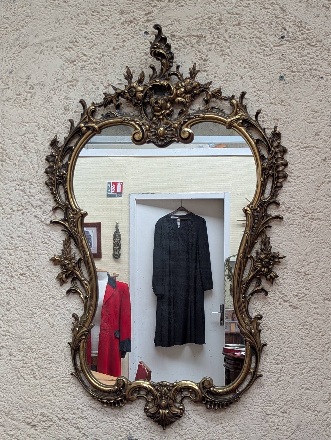 Gold metal wall mirror