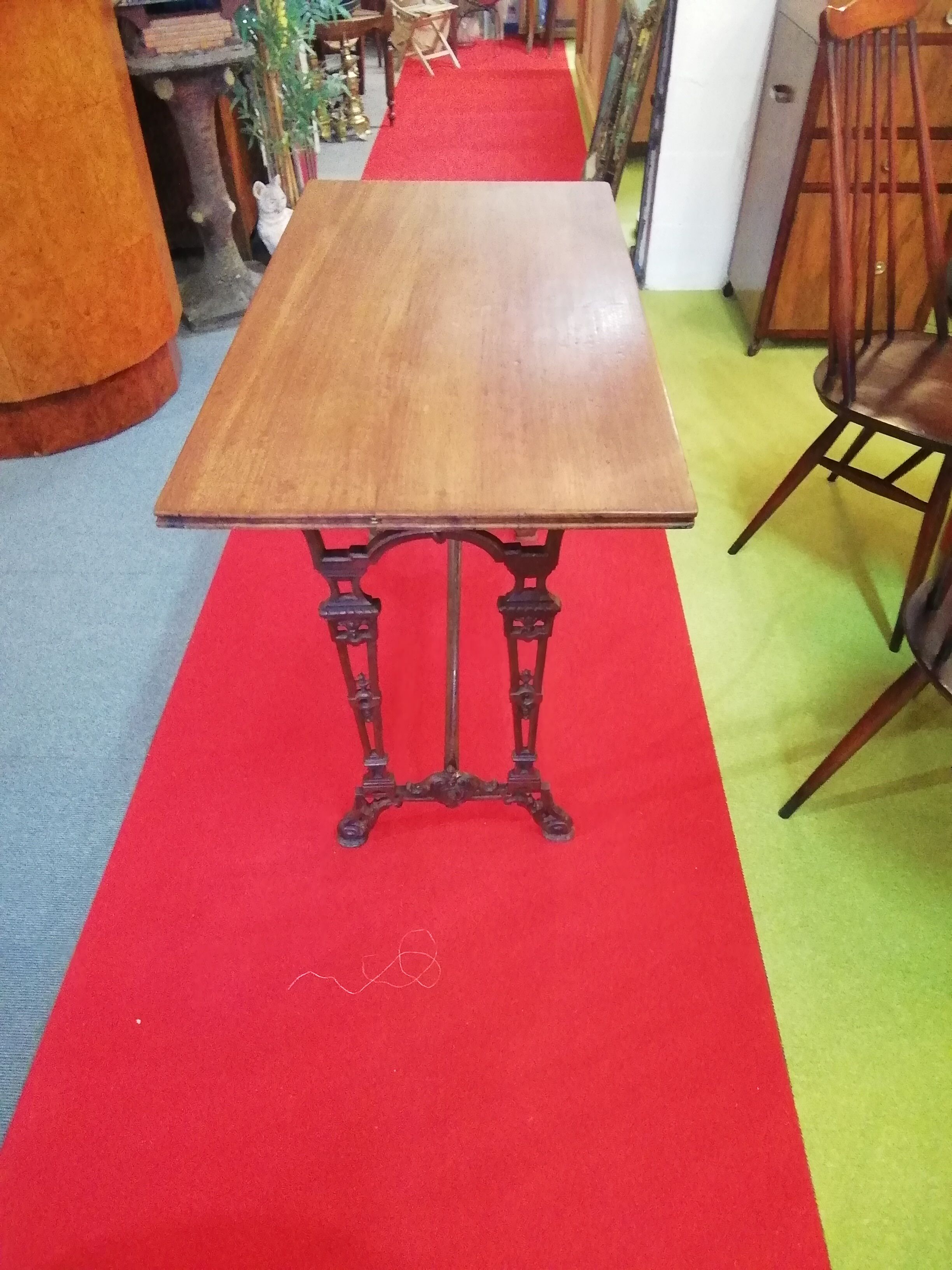 Bistro table over wood cast iron legs