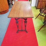 Bistro table over wood cast iron legs