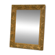 19th-century mirror in wood and stucco with floral decoration.