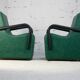 Pair of armrest heaters. Steel and green imitation leather. France, circa 1980