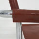 Tubular dining chair with arm rests, 1970's