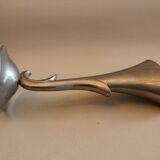 Ancient metal art deco plant-shaped vase