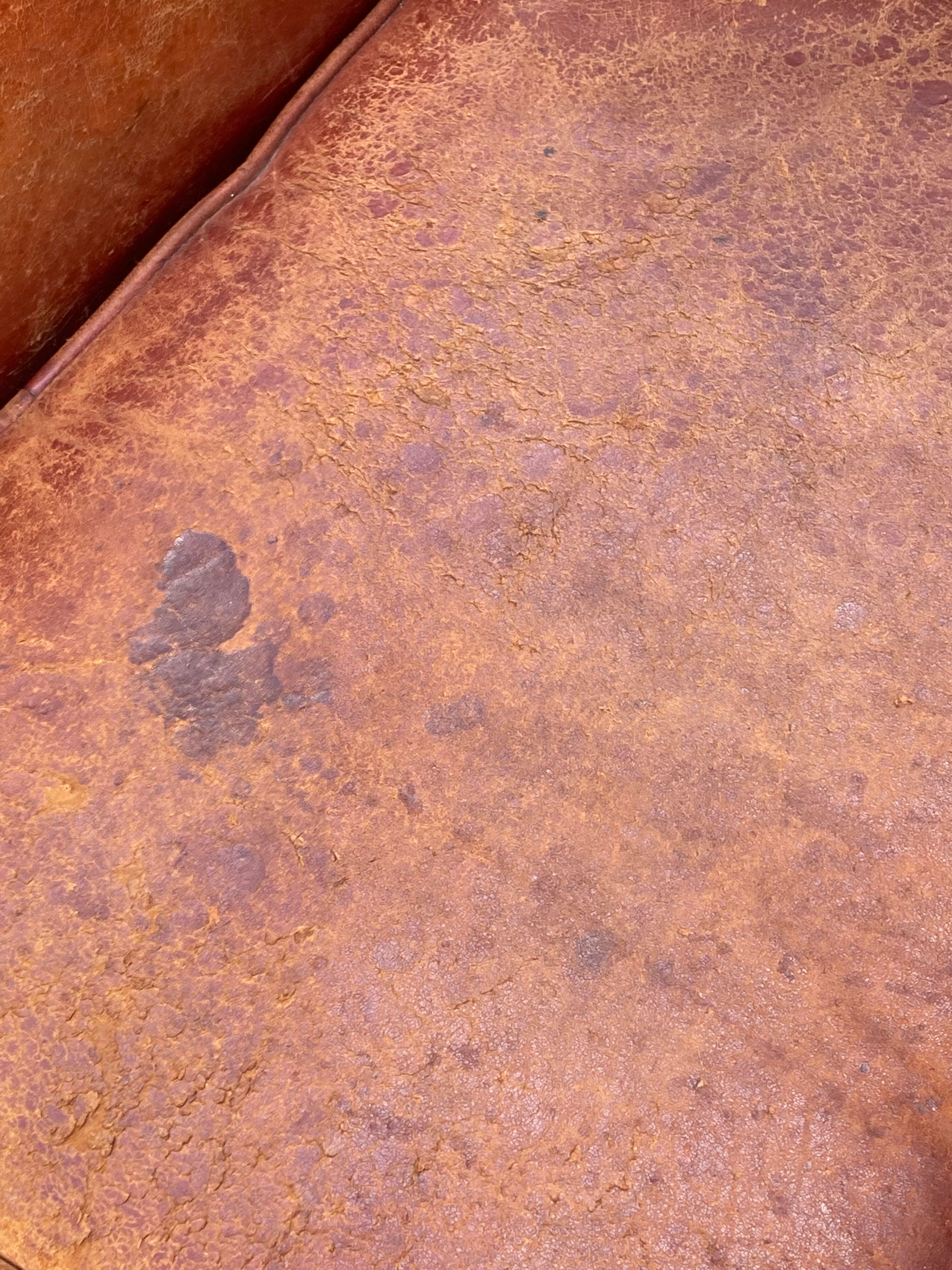 Pair of vintage club armchairs