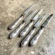 5 TG silver monogrammed dessert knives by Félix Malique, late nineteenth century