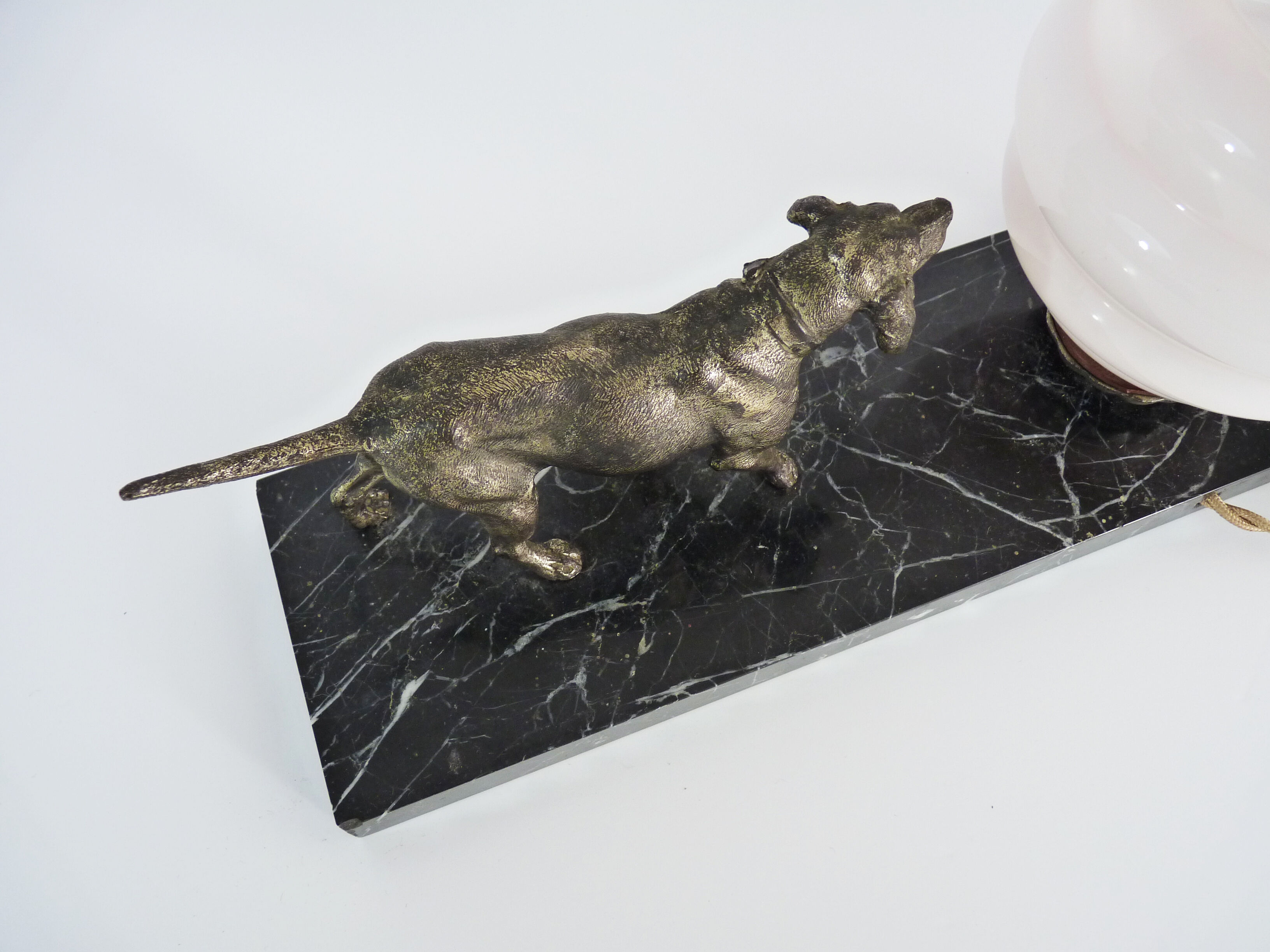 Lamp, Art Deco night light, dog on black marble base, pink globe. Year 30