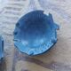 2 ceramic dishes decorated with fish (cups)