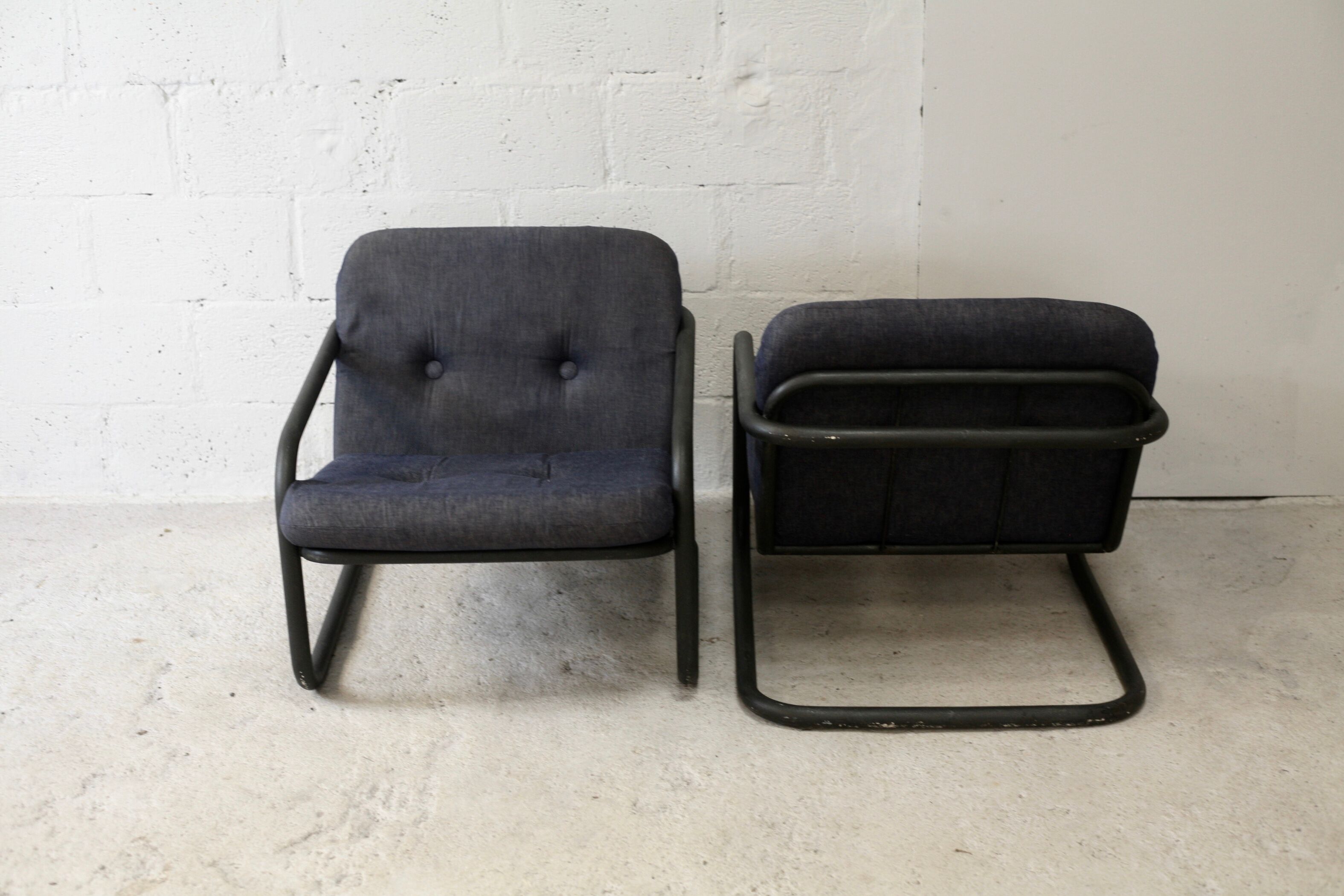 Pair of Prisunic edition armchairs, tubular steel and foam cushions, France, 1973