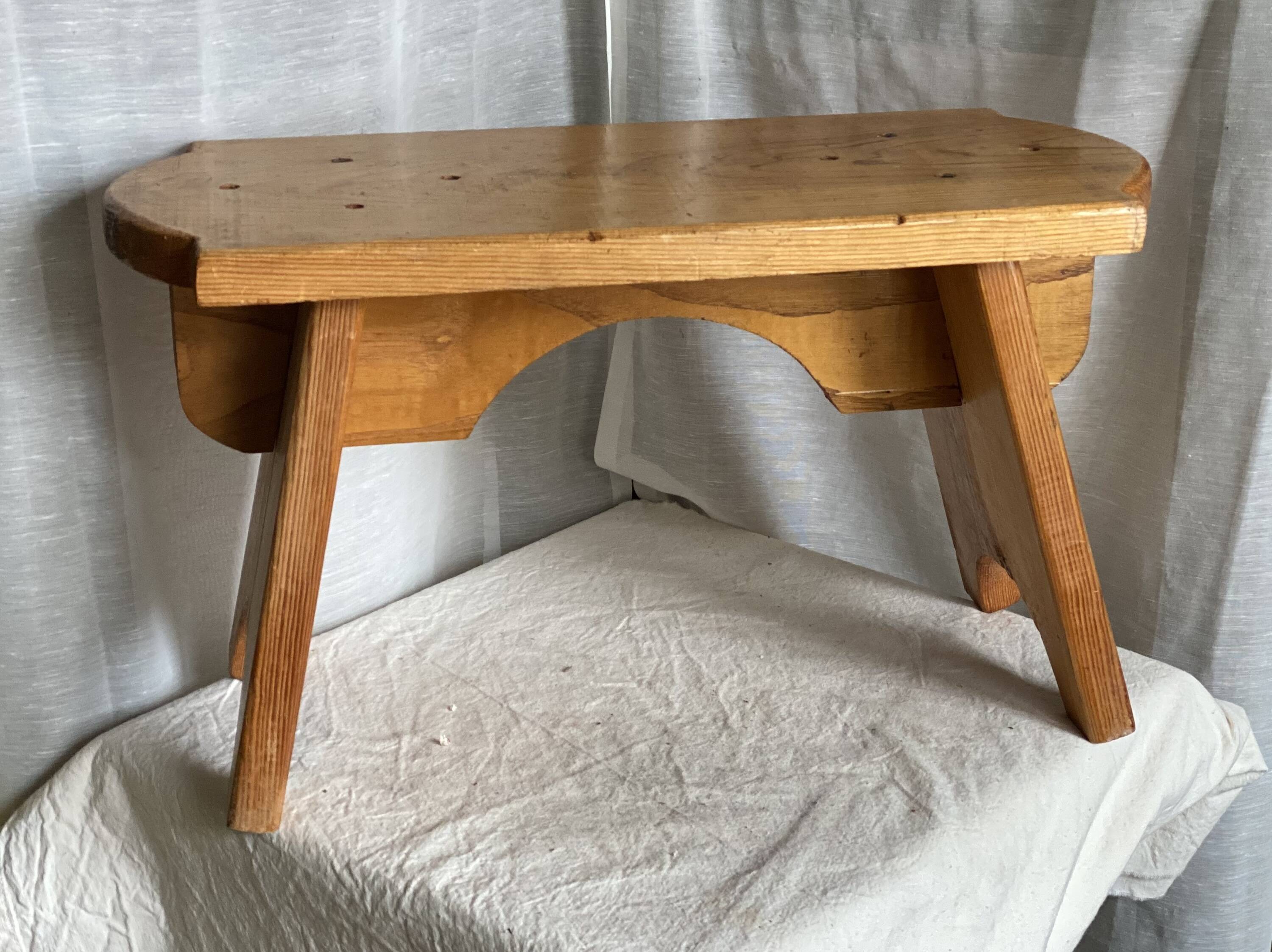 Rustic stool with compass legs, mountain furniture