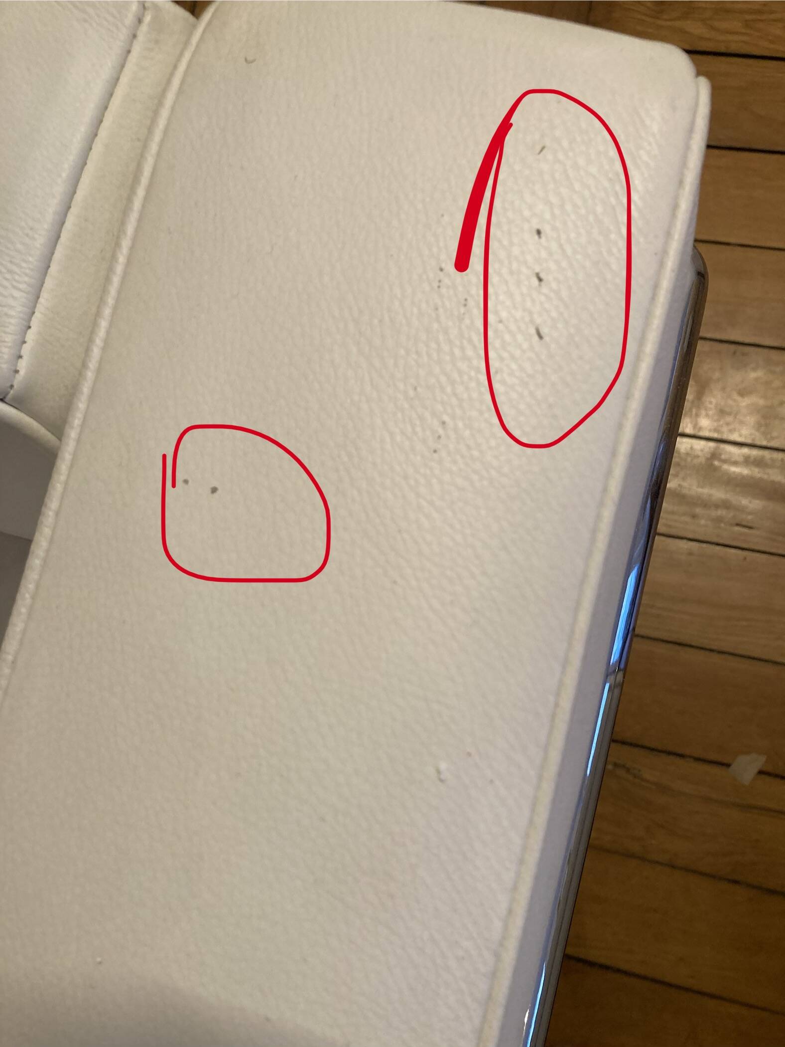 Pair of white leather and chrome armchairs