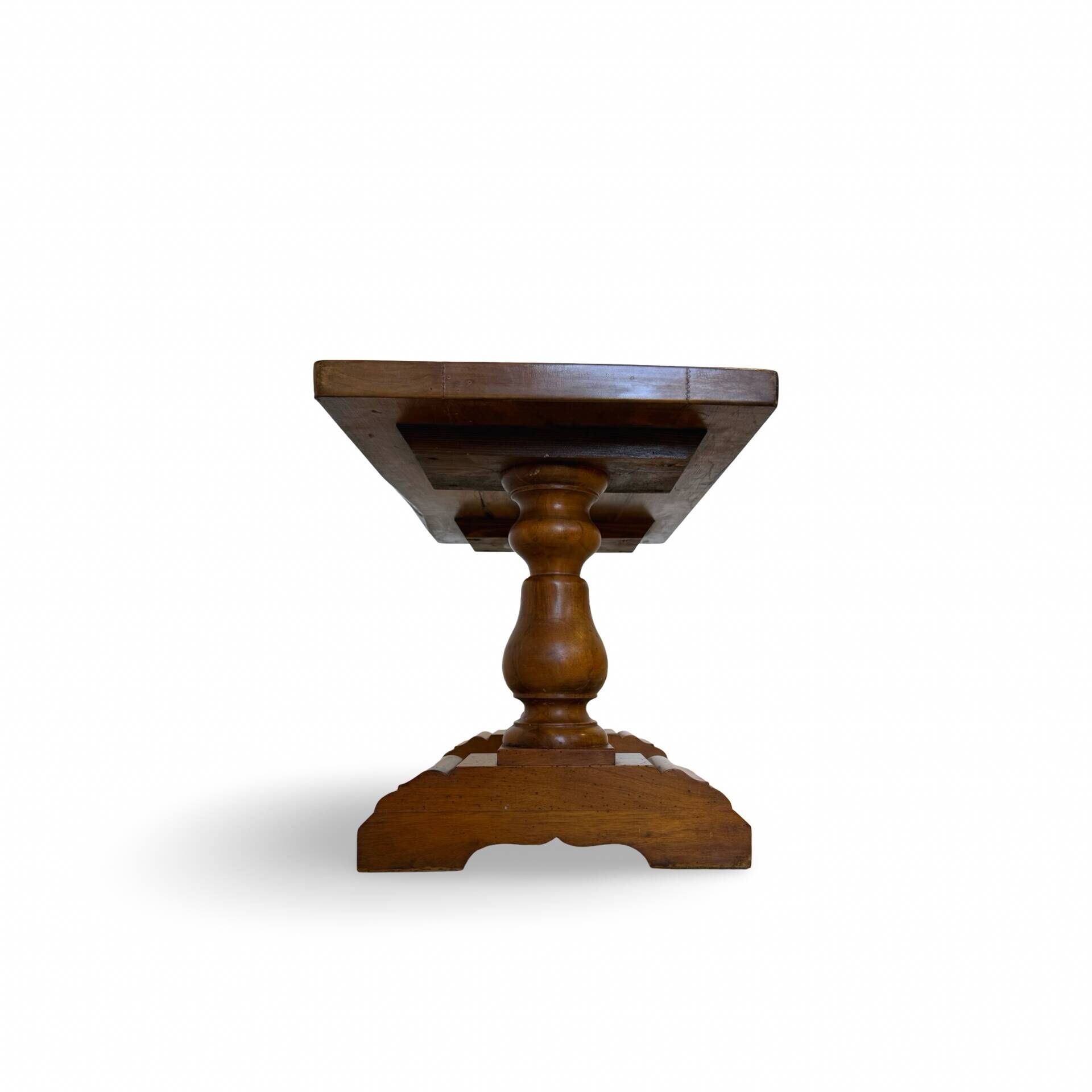 A small, rustic walnut wooden table, crafted from solid walnut wood, 1