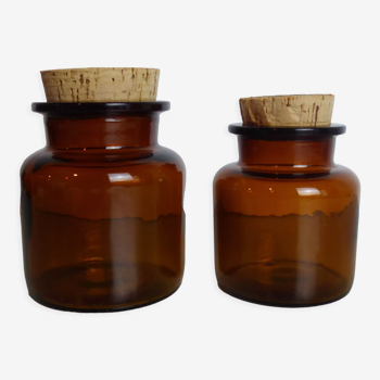 Duo of amber glass jars