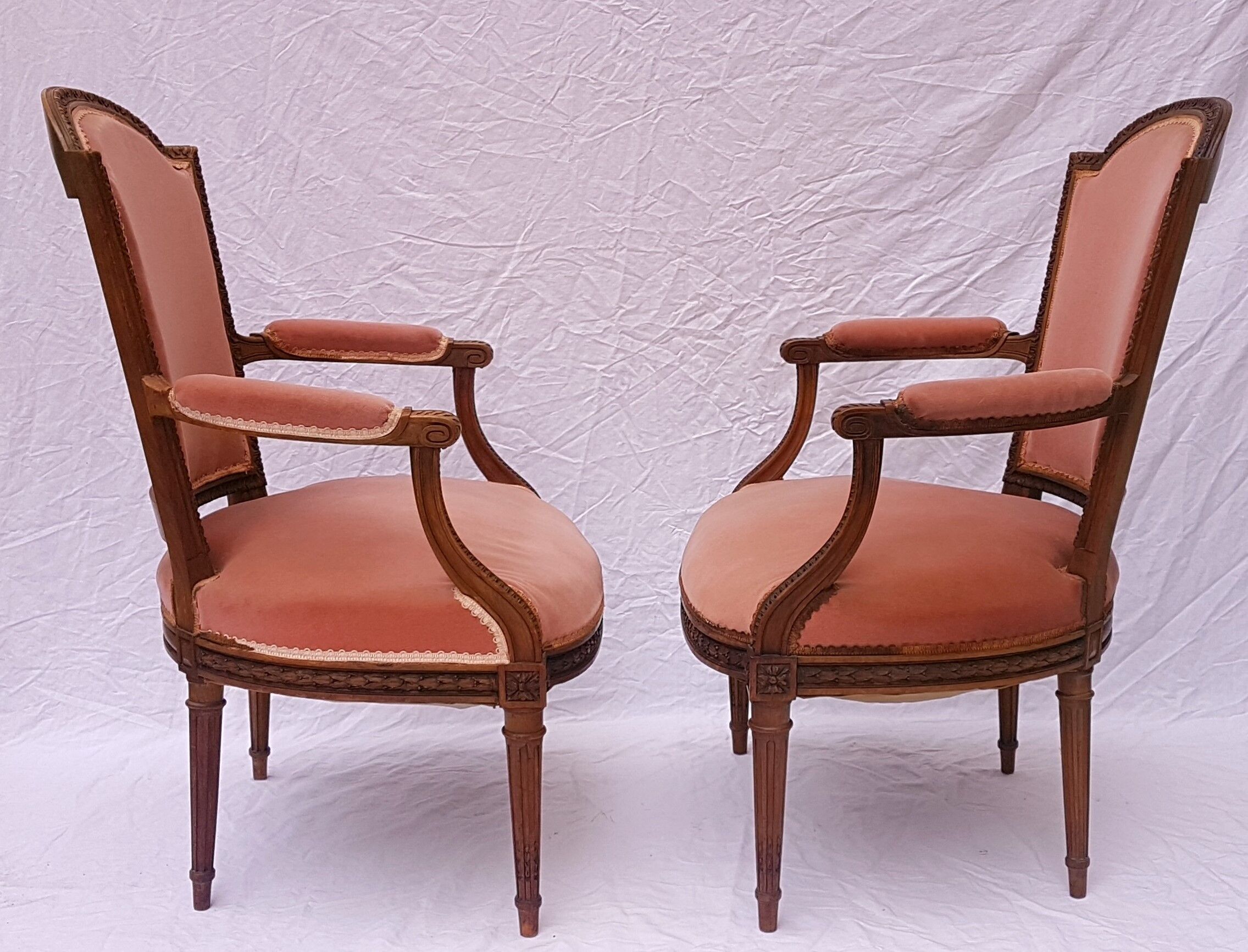 Pair of Louis XVI-style convertible armchairs