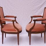 Pair of Louis XVI-style convertible armchairs