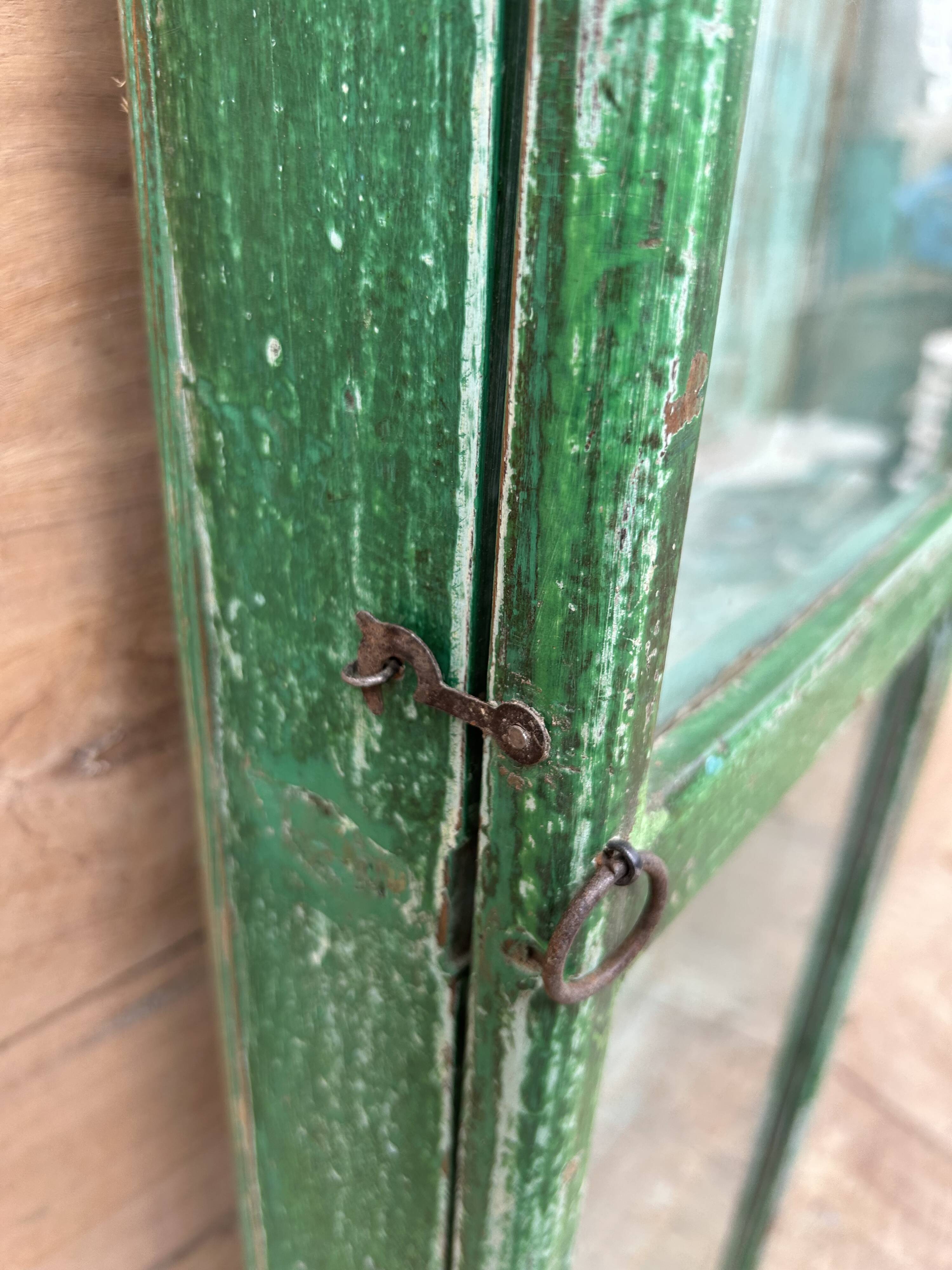 Wall display cabinet in Burmese teak with original patina.