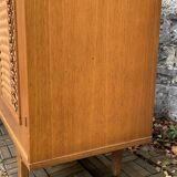Rattan wardrobe and its compass-legged chest of drawers, 1960