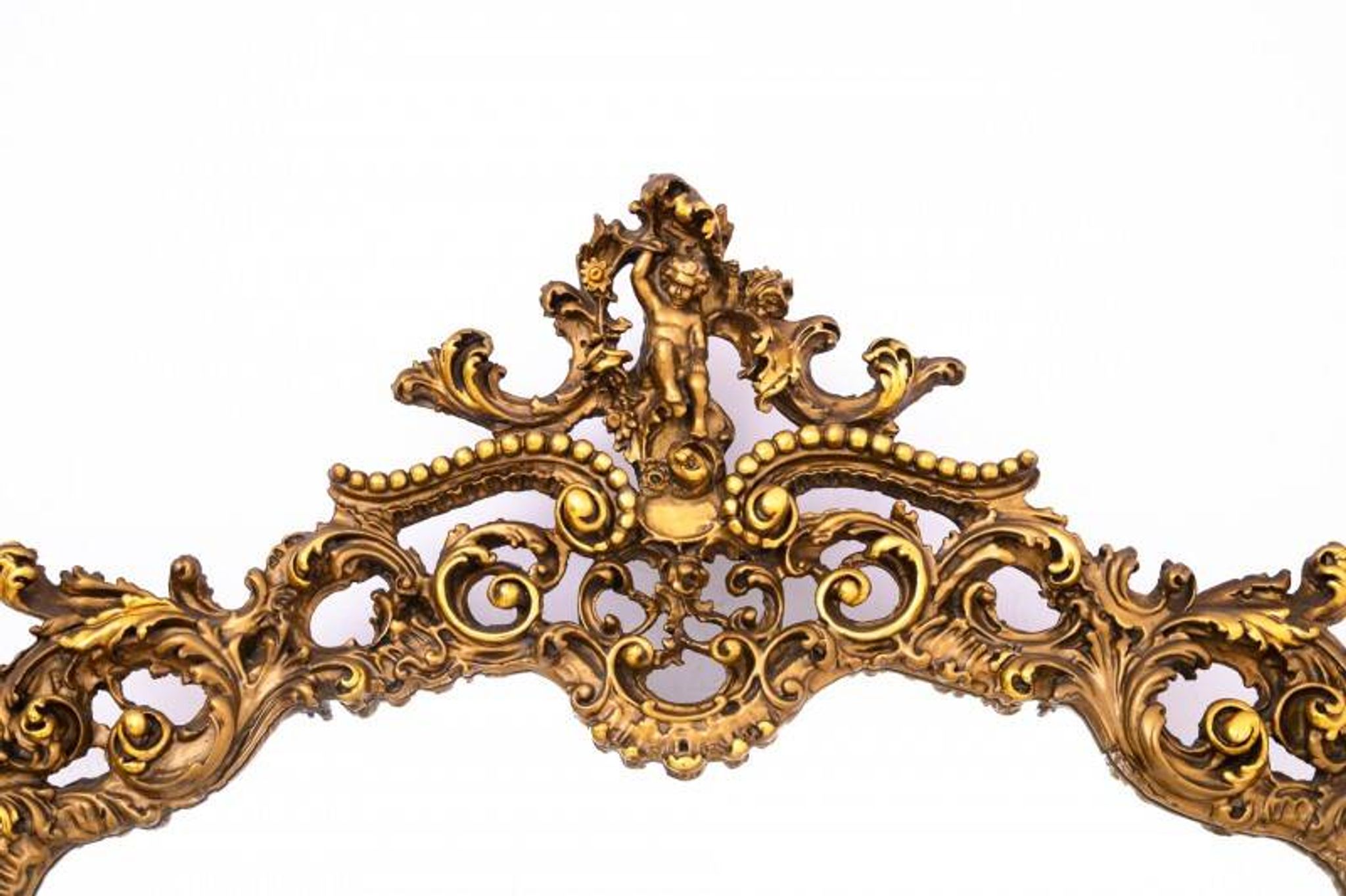 A large mirror in a gold frame, Italy, first half of the 20th century.