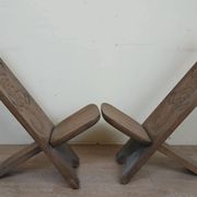 Central Africa circa 1950: pair of exotic wood chairs decorated with crocodile sculptures