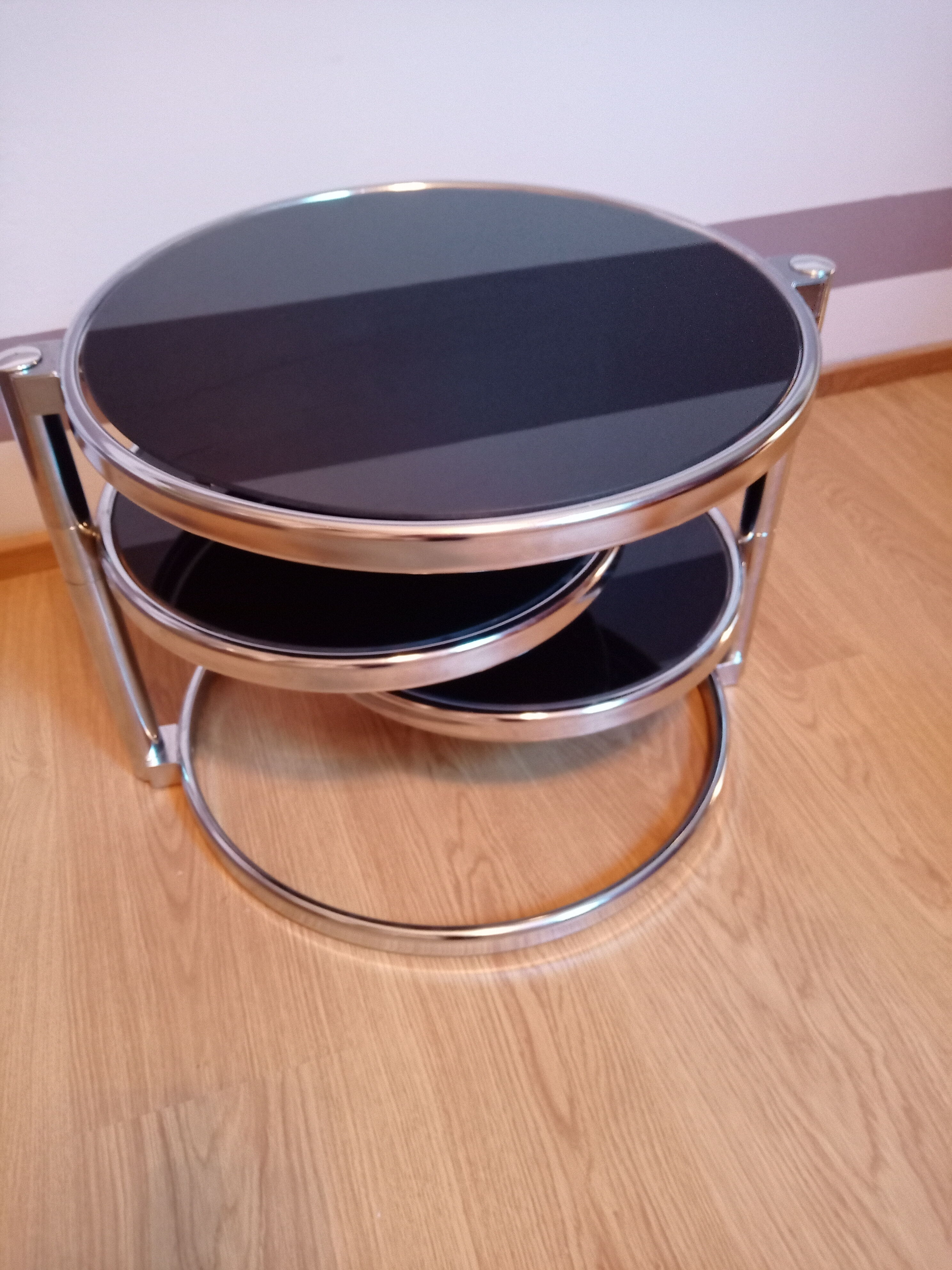 Chrome metal coffee table and swivel-tray glass