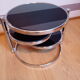Chrome metal coffee table and swivel-tray glass