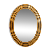 Old golden oval mirror