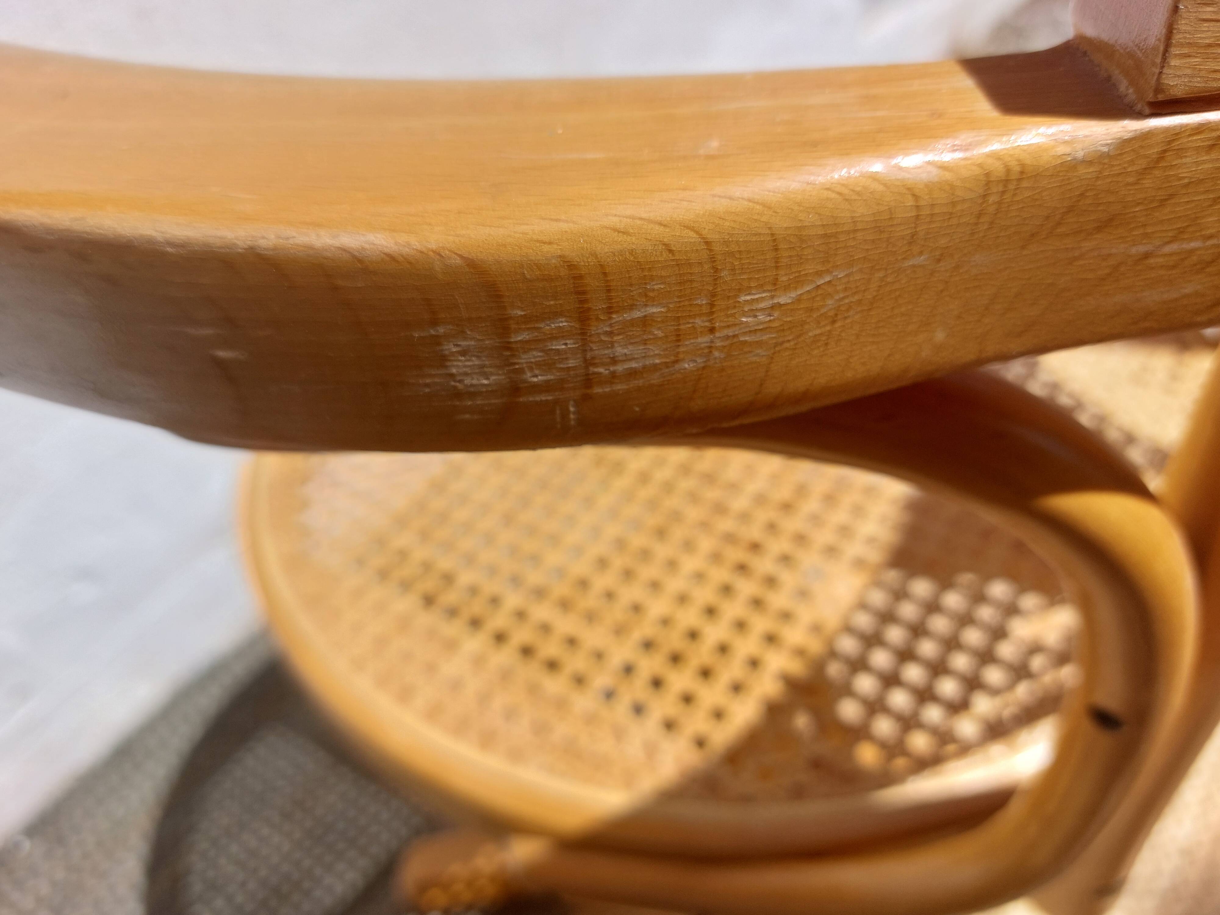 swivel armchair in wood and cane