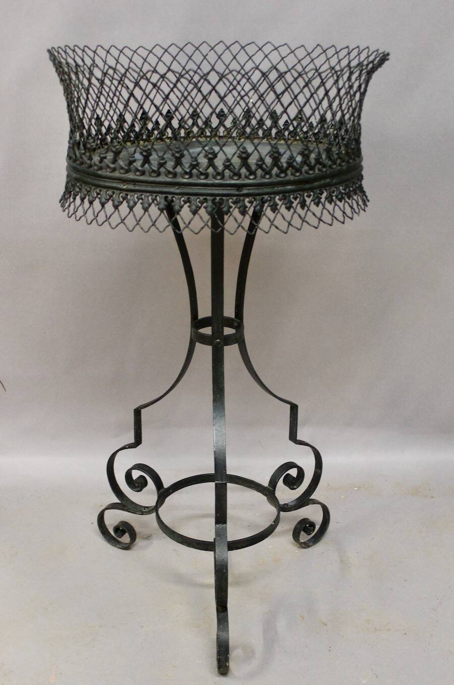 Wrought iron planter on stand