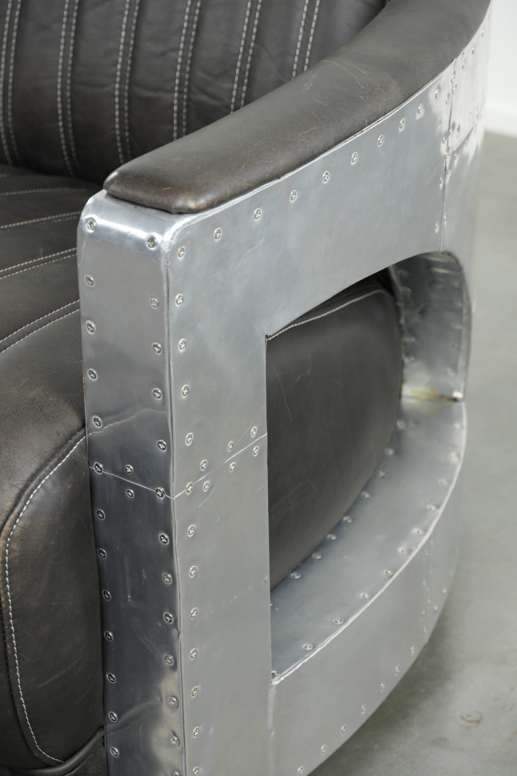 Comfortable cow leather aviator design armchair finished with aluminium