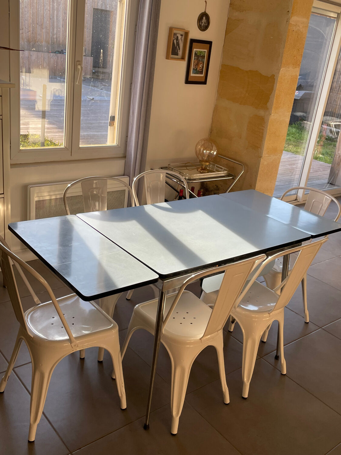 Blue Formica table for 4 to 6 people