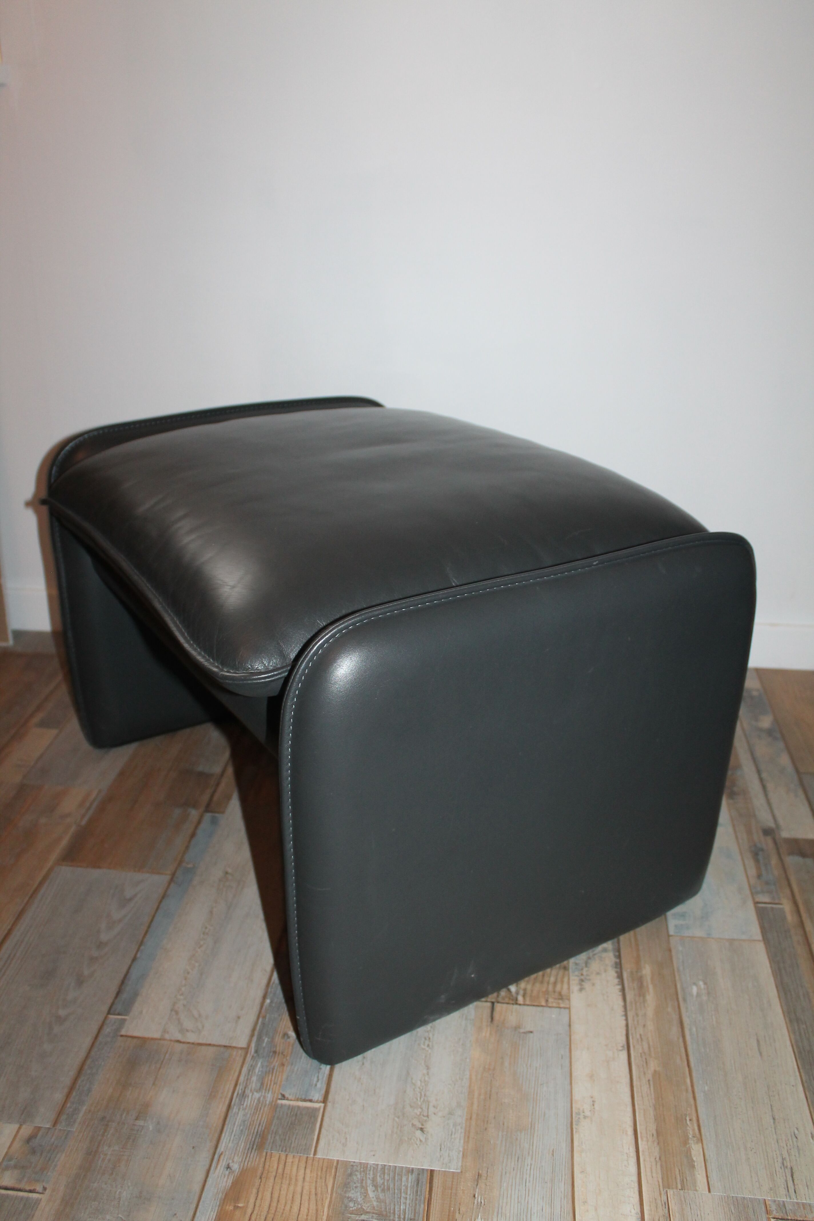 Fauteuil et ottoman cuir Leolux par Axel van Enthoven