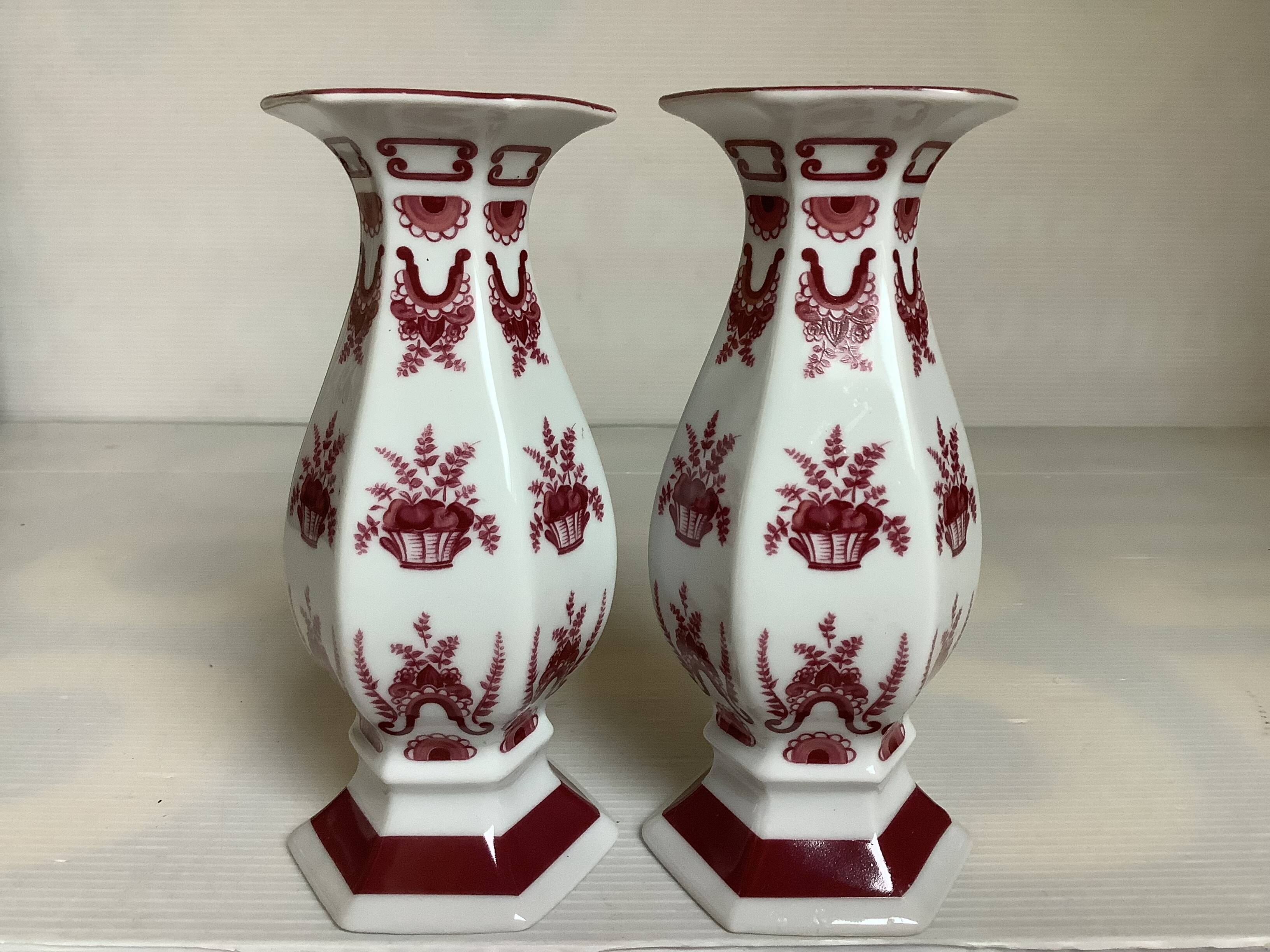 Pair of hexagonal burgundy candlesticks