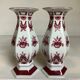 Pair of hexagonal burgundy candlesticks