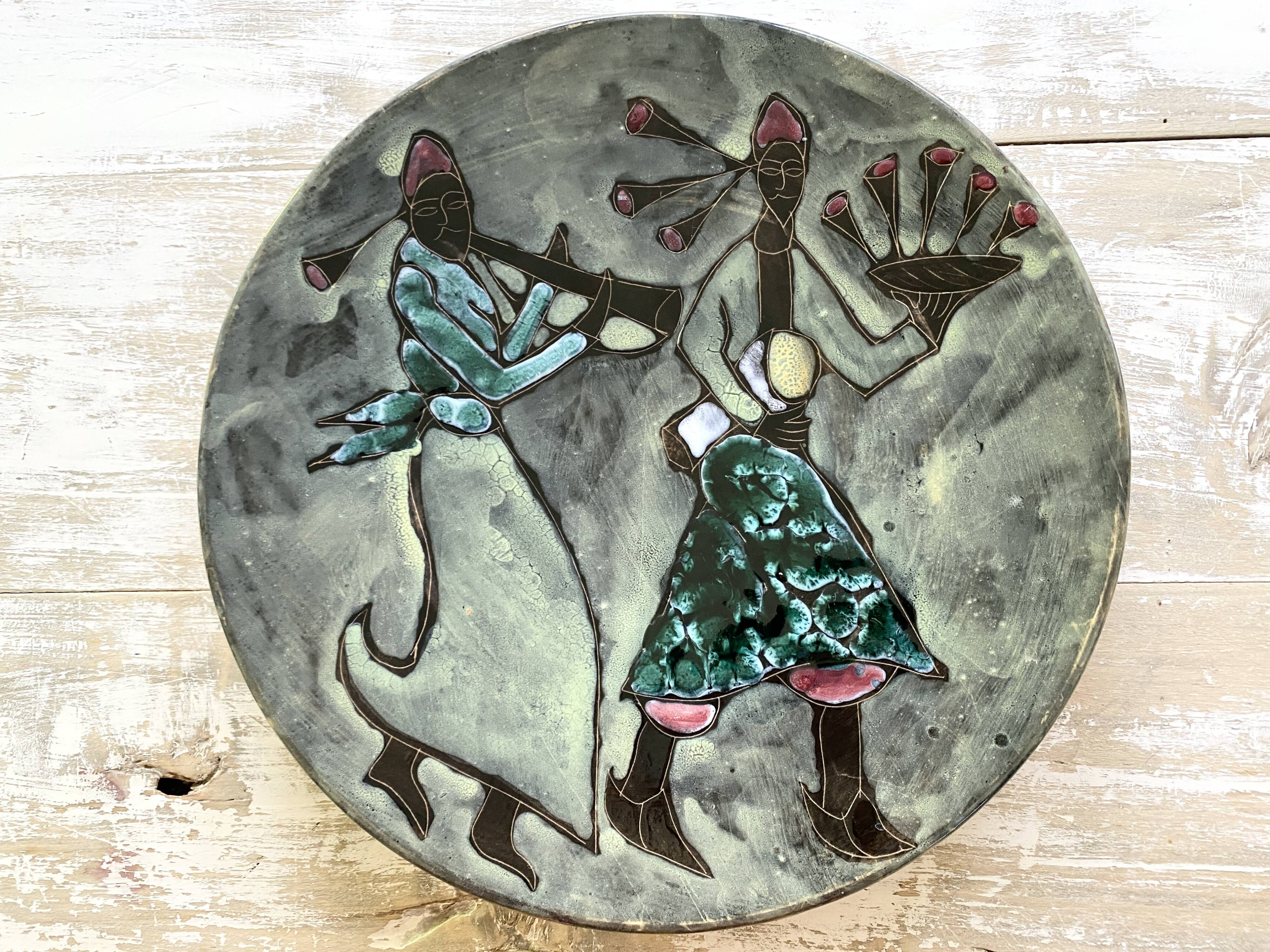 Musicians ceramic dish, signed