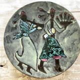Musicians ceramic dish, signed