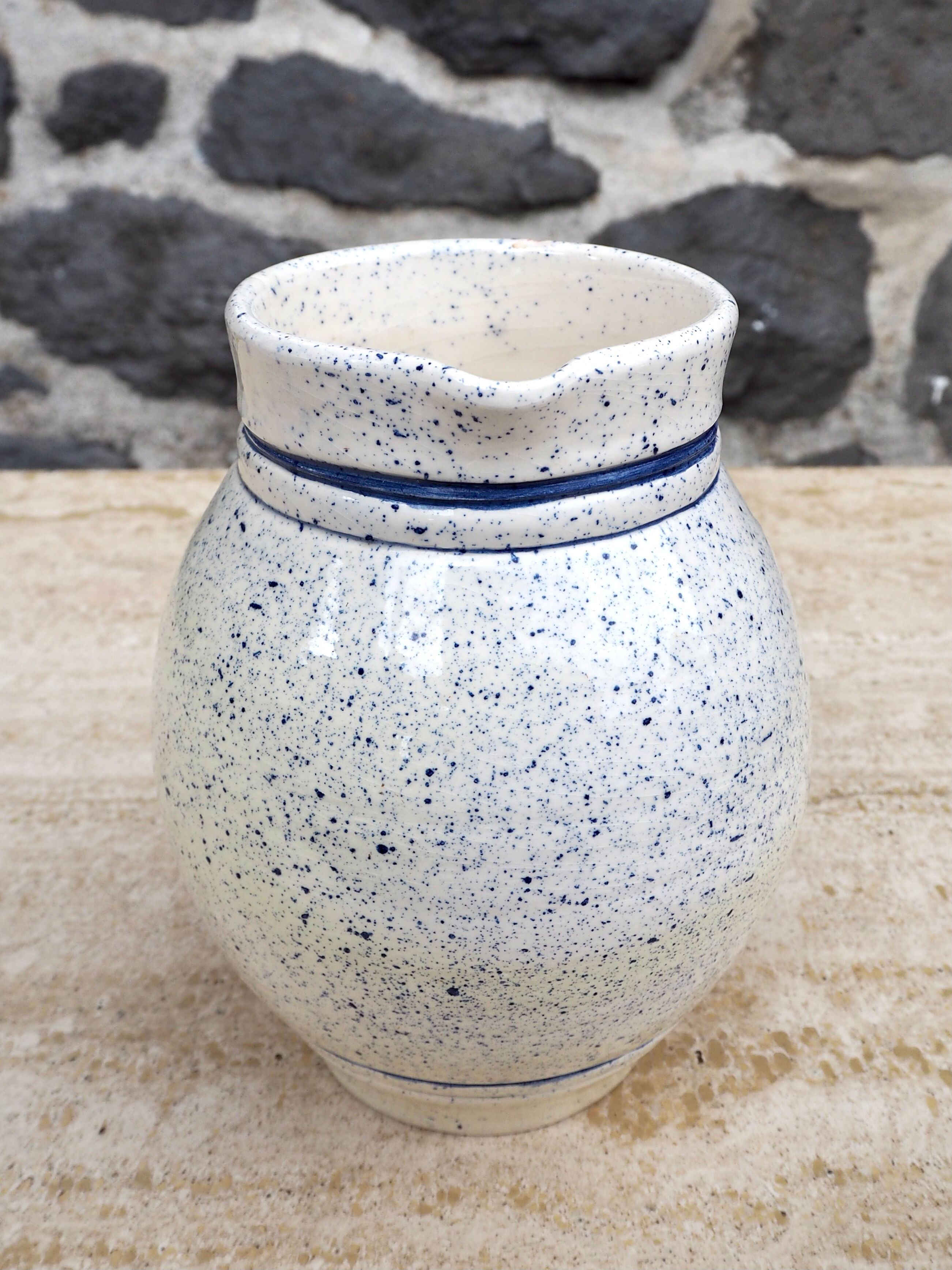Speckled ceramic pitcher