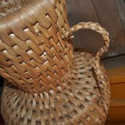 Large beige (wheat) woven wicker floor vase, Mid-Century style from the 1940s.